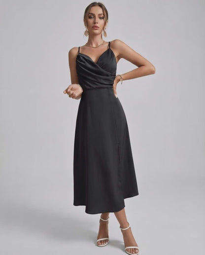 Noiré Midi Dress featuring a sleek black satin finish, delicate spaghetti straps, and refined cowl neck design by Lauven.