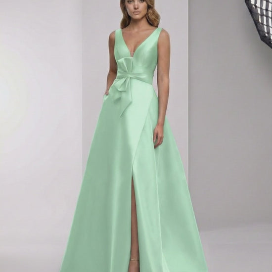 Elaris Maxi Dress in mint green satin featuring A-line elegance and modern wrap detail by Lauven.