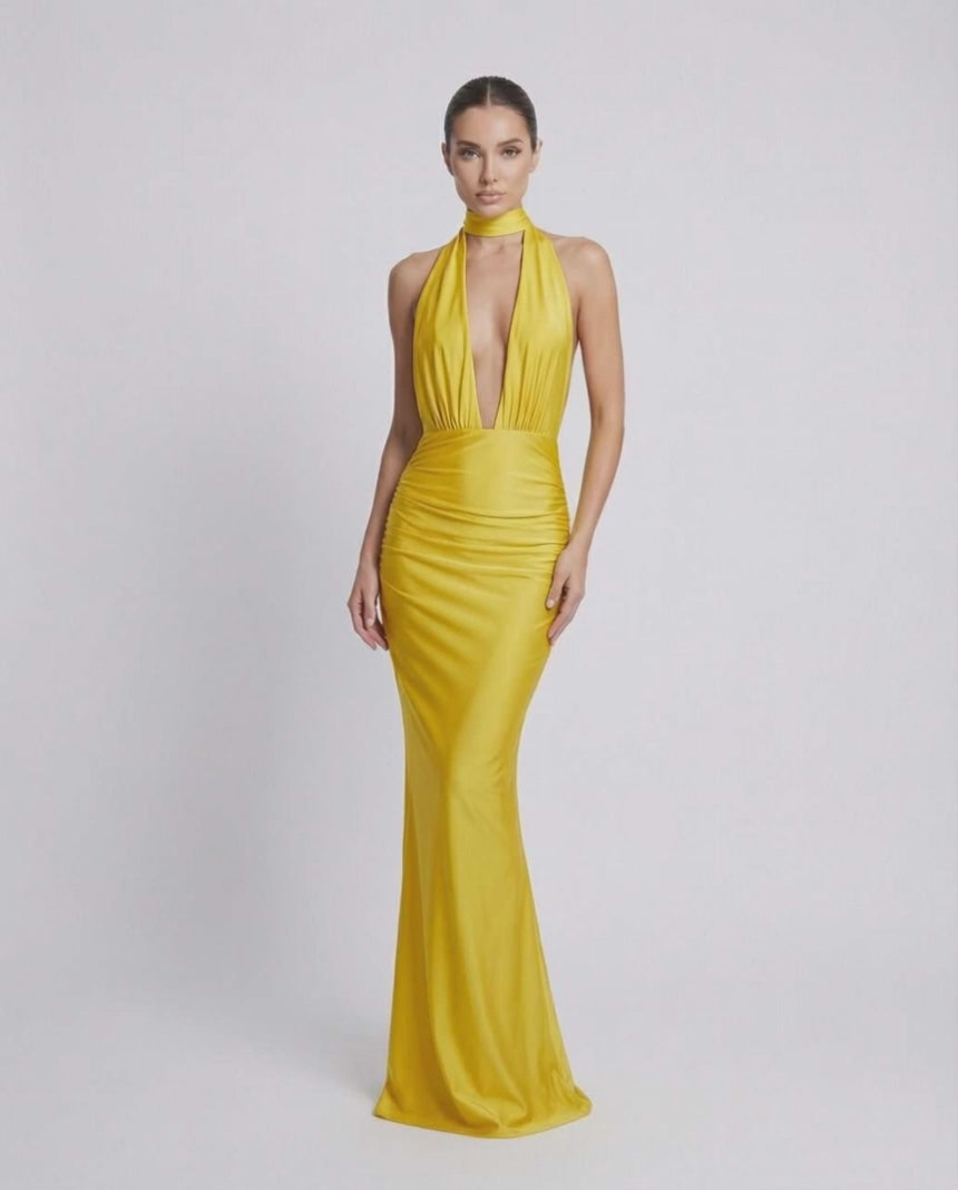 Solara Maxi Dress in vibrant yellow, featuring halter neckline, deep plunge, and high waist by Lauven.