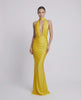 Solara Maxi Dress in vibrant yellow, featuring halter neckline, deep plunge, and high waist by Lauven.