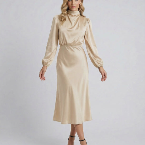 Lauven Sienna Midi Dress in champagne satin with high neck and long sleeves, showcasing elegant style and luxury.