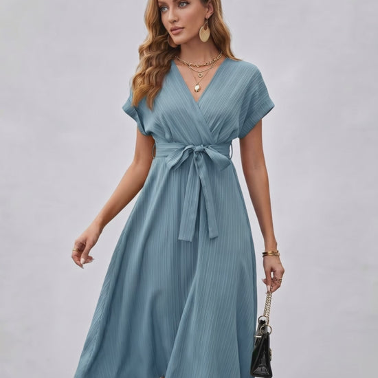 Serene Midi Dress featuring pleated fabric, V-neck, self-tie belt by Lauven, perfect for stylish day-to-evening wear.