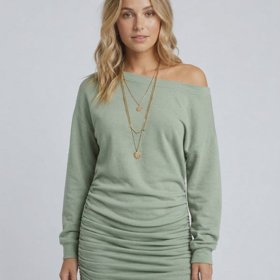 Celeste Mini Dress by Lauven in calming sage green with gathered drawstring detail.