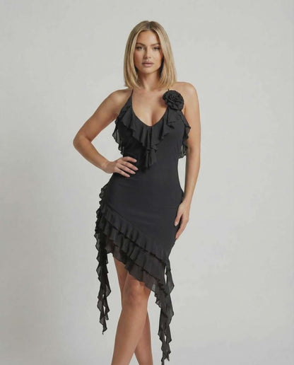 Noir Mini Dress by Lauven with ruffle detail and asymmetric hemline in classic black.
