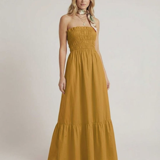 Valora Maxi Dress - Mustard yellow strapless maxi dress with smocked bodice by Lauven, perfect for summer. 