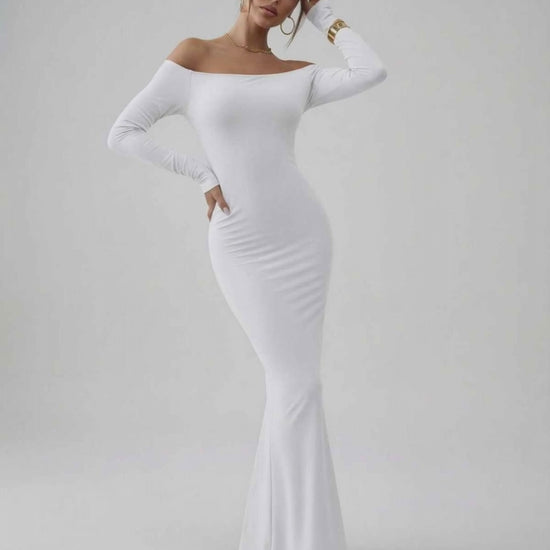 Lauven Orion Maxi Dress in classic white, featuring off-shoulder long sleeves and smooth stretch fabric.