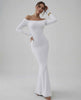Lauven Orion Maxi Dress in classic white, featuring off-shoulder long sleeves and smooth stretch fabric.