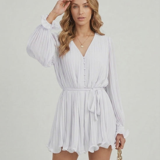 Lauven Luna Mini Dress in classic white pleated chiffon with elegant details and flowing silhouette.