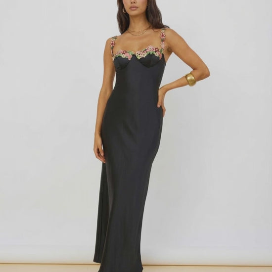 Calista Maxi Dress in black satin with floral embroidery, designed by Lauven for an elegant, fluid silhouette.
