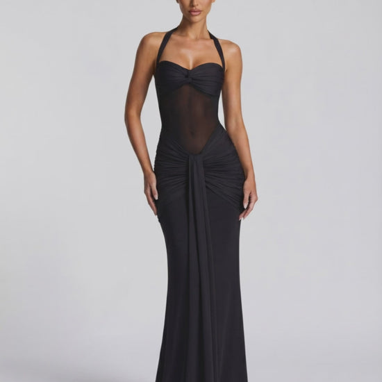 Sienna Maxi Dress featuring black halter style, sheer mesh panel, mermaid silhouette by Lauven.