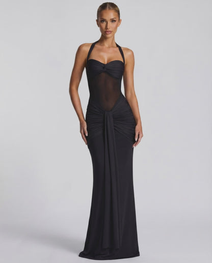 Sienna Maxi Dress featuring black halter style, sheer mesh panel, mermaid silhouette by Lauven.