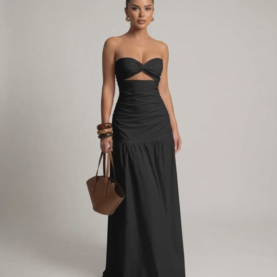Noira Maxi Dress, black strapless design, cutout high waist silhouette, elegant fit from Lauven brand.