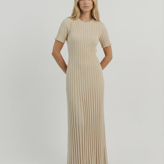 Celeste Maxi Dress by Lauven features elegant ribbed knit in beige with a flowing ankle-length silhouette.
