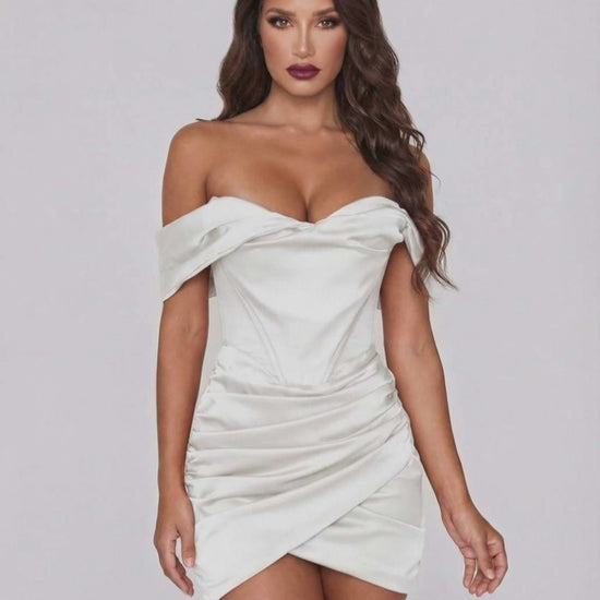 Lauven Aurora Mini Dress featuring luxe satin off-shoulder design and elegant wrap-style skirt.
