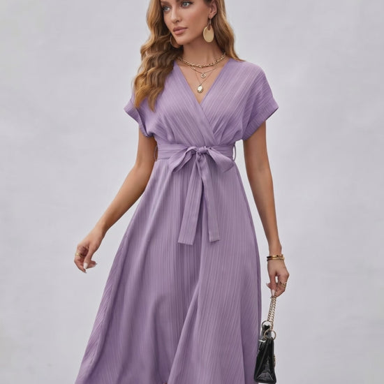 Serene Midi Dress by Lauven, pleated fabric, V-neck, self-tie belt, elegant, versatile, modern wardrobe.