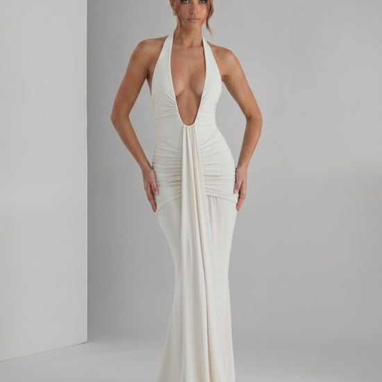 Aurelia Maxi Dress featuring sleek stretch jersey fabric, halter neck, and body-skimming silhouette by Lauven.