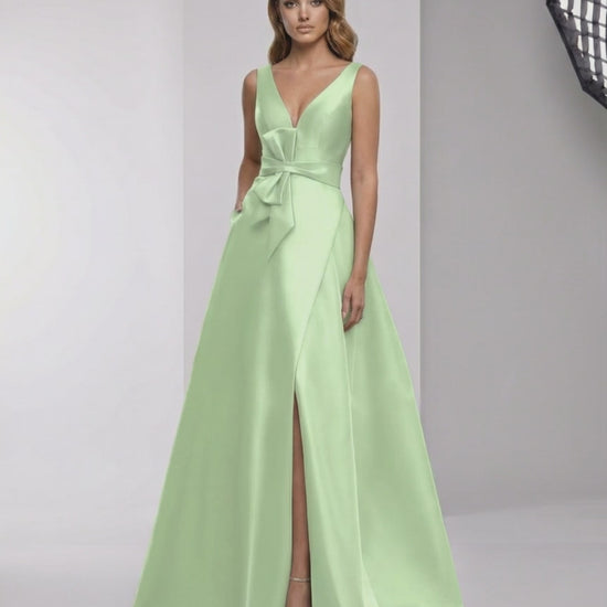 Calytrix Maxi Dress in mint green satin with wrap slit and bow detail by Lauven for elegant formal occasions.