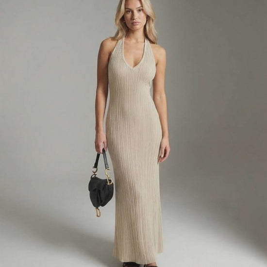 Serena Maxi Dress featuring a ribbed knit texture, V-neckline, and slim fit in delicate beige by Lauven.