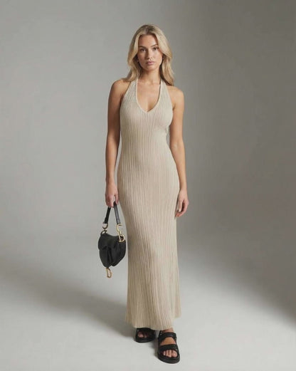 Serena Maxi Dress featuring a ribbed knit texture, V-neckline, and slim fit in delicate beige by Lauven.