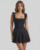 Serena Mini Dress by Lauven, sleek black cotton blend dress with ruffle details and square collar neckline.