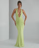 Aurelia Maxi Dress in light green, featuring a halter neck and smooth stretch jersey fabric for a sleek silhouette.