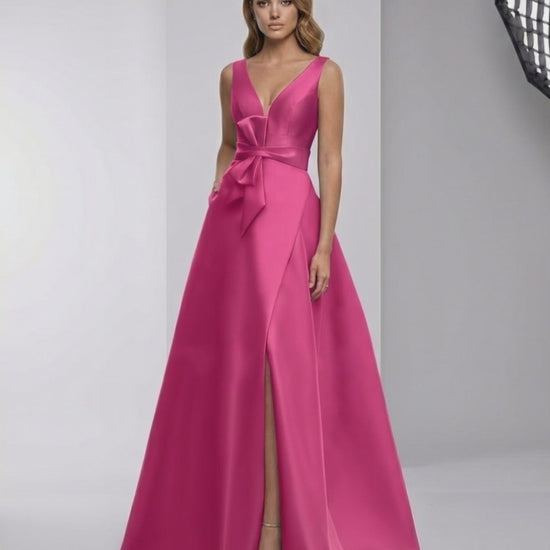 Calyptra Maxi Dress in fuchsia satin features a V-neck and A-line silhouette by Lauven, delivering elegance and modern style.