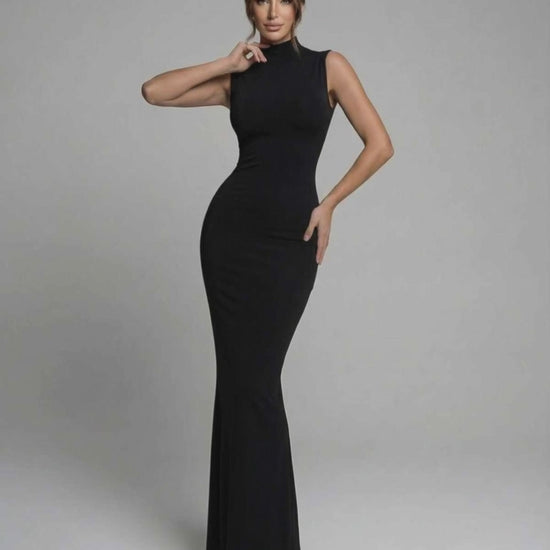 Noctra Maxi Dress: Black sleeveless dress with mock neck, tailored fit, and elegant floor-length silhouette by Lauven.