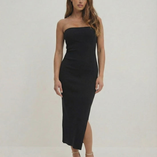 Noctis Midi Dress by Lauven – Elegant strapless black sheath dress with a side slit and slim fit.
