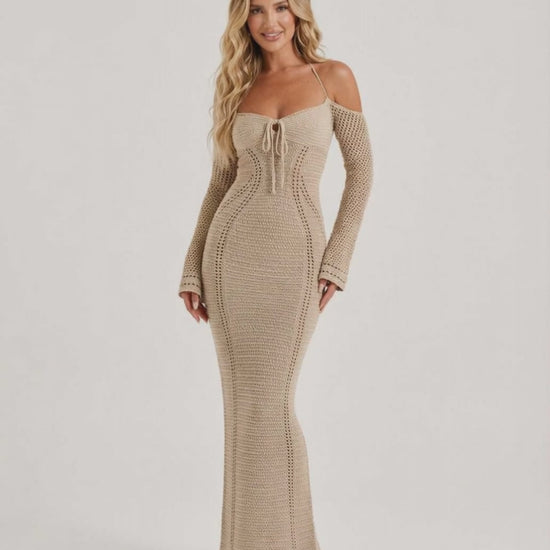 Soleil Maxi Dress - Textured Knit Long Sleeve Dress with Open Back Detail by Lauven, showcasing a stylish and refined silhouette.