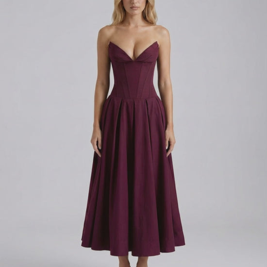 Aveline Midi Dress featuring a fitted bodice, V-neckline, and a flowing skirt by Lauven, perfect for elegant occasions.
