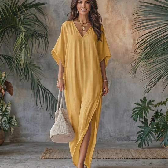 Solara Maxi Dress in lightweight chiffon, V-neck with fluid movement, ideal for warm weather. By Lauven.