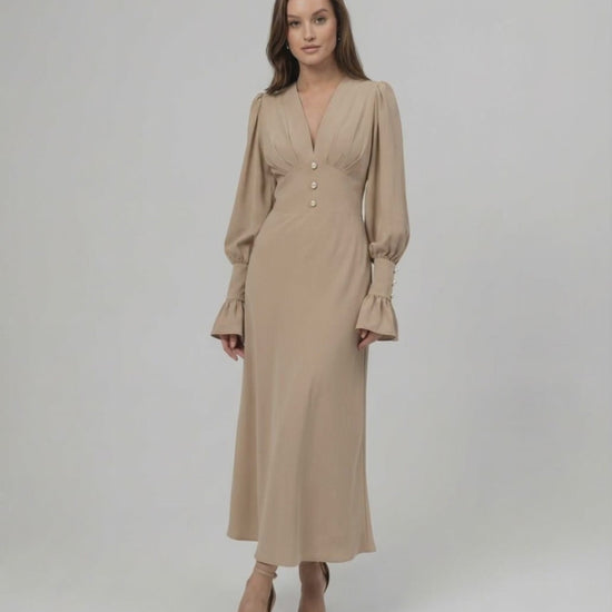 Sienna Midi Dress in beige, long sleeve A-line design by Lauven, featuring a V-neckline and sculpted high waist for elegance.