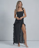 Elegant Lauven Nocturne Maxi Dress in black, featuring ruffled straps and thigh-high slit.