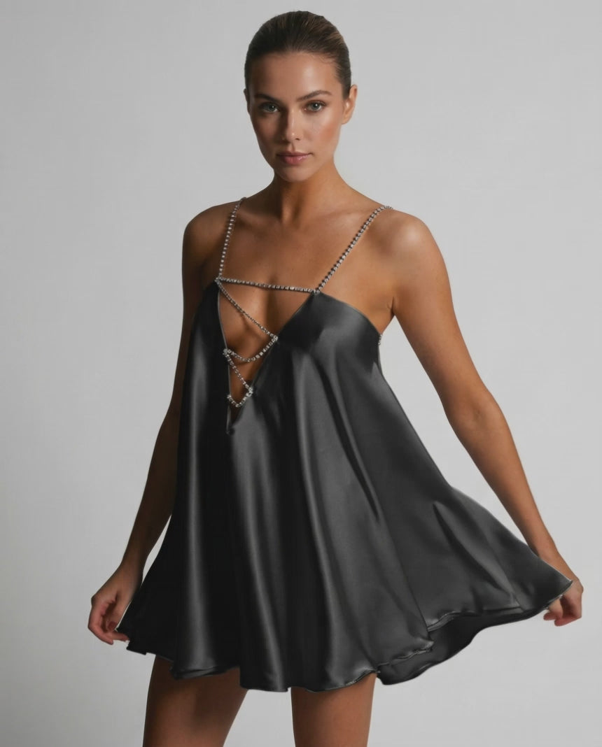 Midnight Mini Dress by Lauven, featuring an A-line silhouette, V-neck, and spaghetti straps for a sexy summer look.
