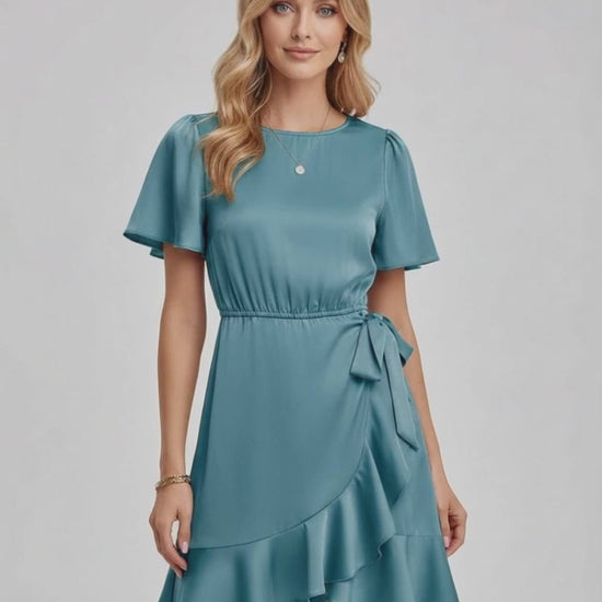 Lauven Luna Mini Dress featuring soft satin finish, ruffle hem, and teal shade, perfect for spring and summer.