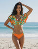 Lauven Citrus Two-Piece Swimsuit featuring orange tropical floral print and deep V-neckline, perfect for beach days.