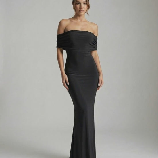 Noir Maxi Dress by Lauven — Elegant off-shoulder silhouette in classic black, showcasing sleek and smooth fabric.