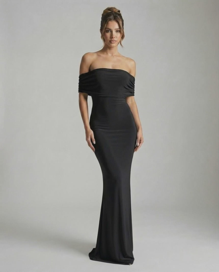 Noir Maxi Dress by Lauven — Elegant off-shoulder silhouette in classic black, showcasing sleek and smooth fabric.