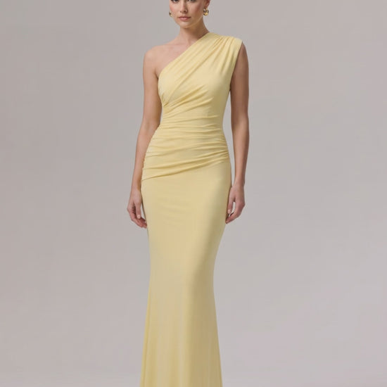 Aurelia Maxi Dress in yellow, one-shoulder design, stretch jersey, offers a sleek silhouette for elevated occasions by Lauven.