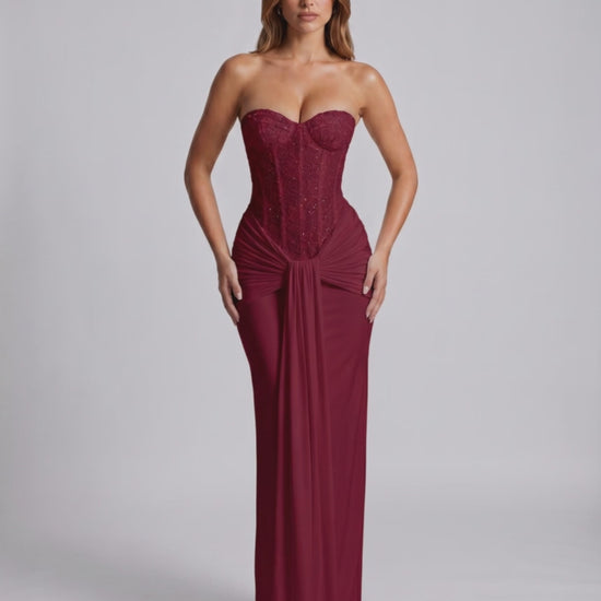 Serelisse Maxi Dress in burgundy, off-the-shoulder style, featuring a corset bodice and smooth polyester-spandex blend.