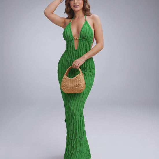 Lunara Maxi Dress in green, textured polyester blend, halter V-neck, perfect for warm weather and elegant occasions.