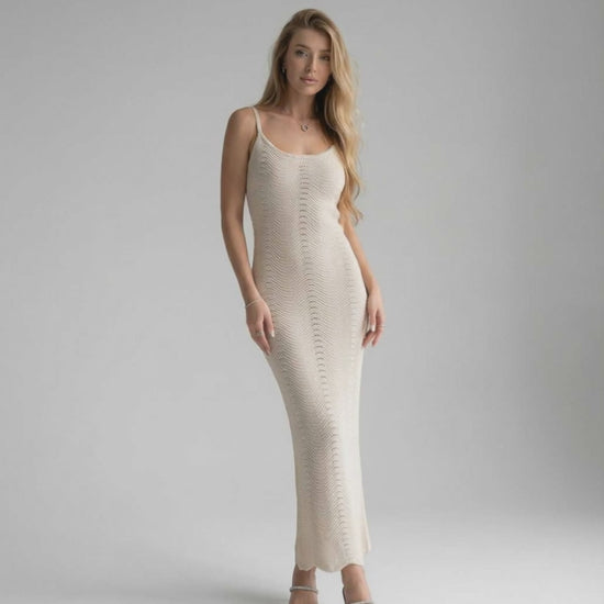 Elara Midi Dress - elegant sleeveless white bodycon dress by Lauven, showcasing a sleek modern look for day-to-evening wear.