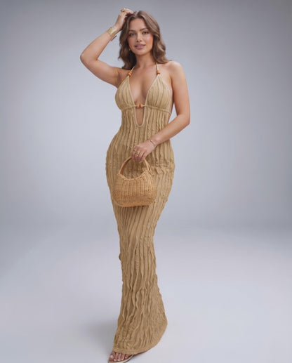 Lunara Maxi Dress in textured polyester blend, featuring halter V-neck, perfect for warm-weather styling by Lauven.