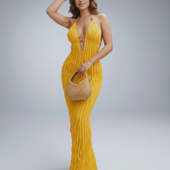 Lunara Maxi Dress in textured polyester blend, halter V-neck design for modern, warm-weather elegance by Lauven.