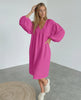 Zafira Midi Dress in vibrant pink, featuring puff sleeves, designed by Lauven for a stylish and comfortable look.