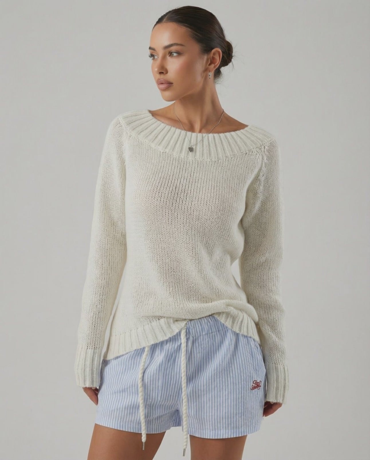 Sienna Sweater by Lauven, women’s boat neck sweater with rib knit detail in a soft knit texture, perfect for cooler days.