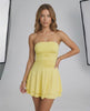Solara Mini Dress by Lauven, strapless soft yellow club style dress showcasing a fitted design and playful flair.