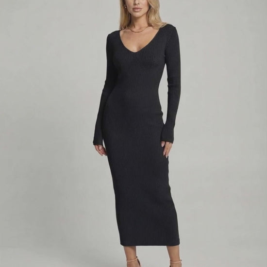 Noir Midi Dress showing a sleek black ribbed v-neck knit design, flattering pencil shape by Lauven for elegant comfort.