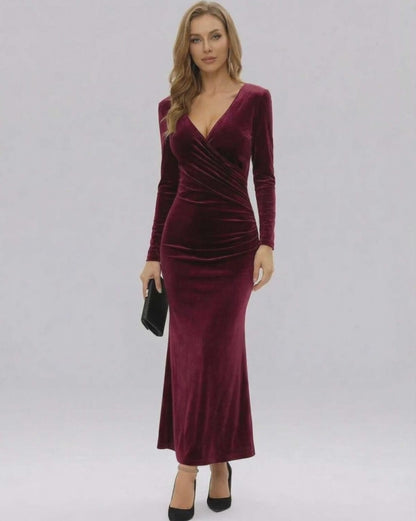 Celeste Maxi Dress by Lauven, showcasing a luxurious burgundy velvet design with long sleeves and a slim-fit silhouette.