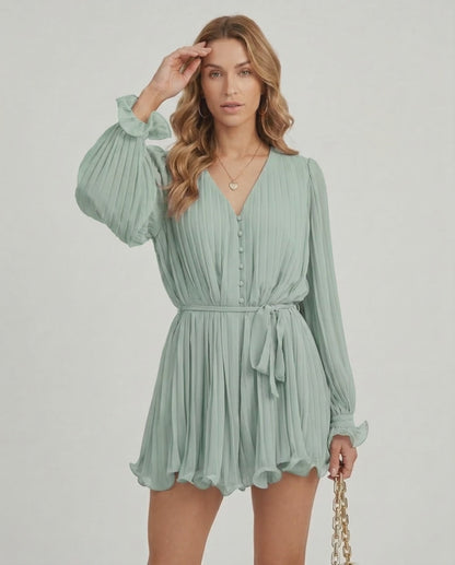 Aurelia Mini Dress by Lauven in soft sage green chiffon with pleated texture and V-neck design.